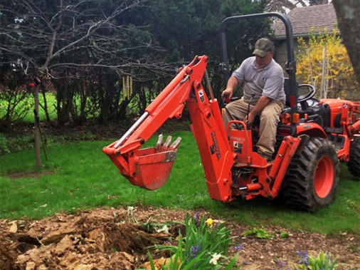 Kubota B2920 Tractor in action 1 of 4